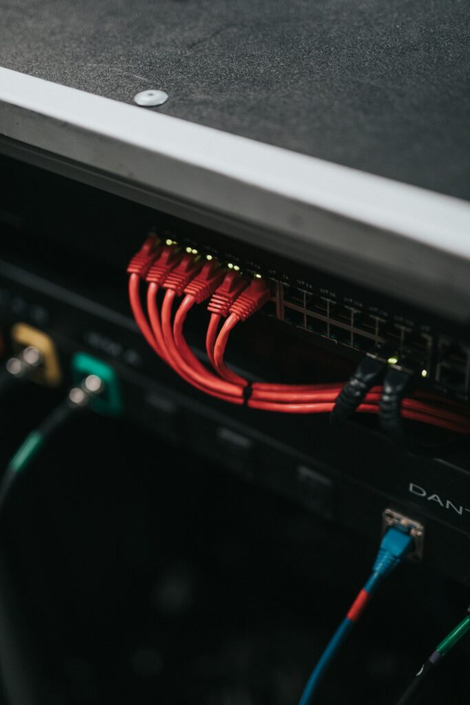 Network switch with red patch cables connected