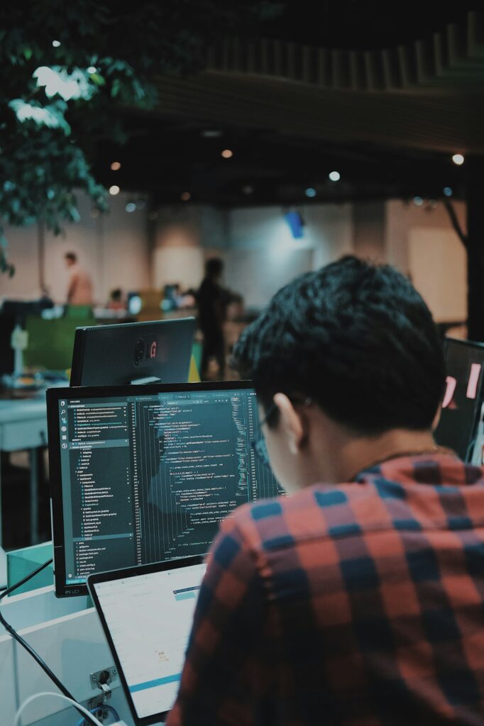 IT professional working at a computer in an office