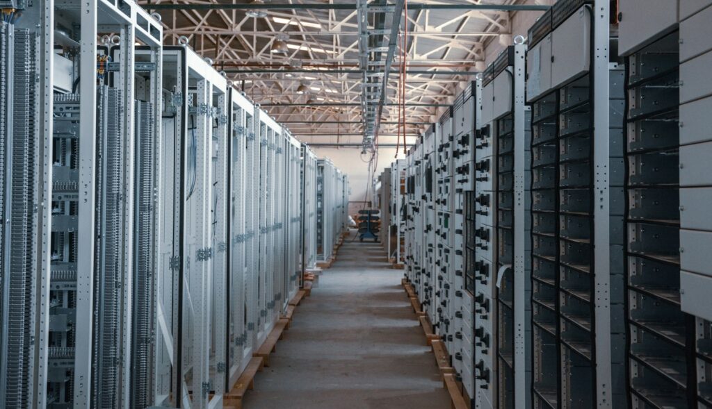 Data center aisle lined with server racks