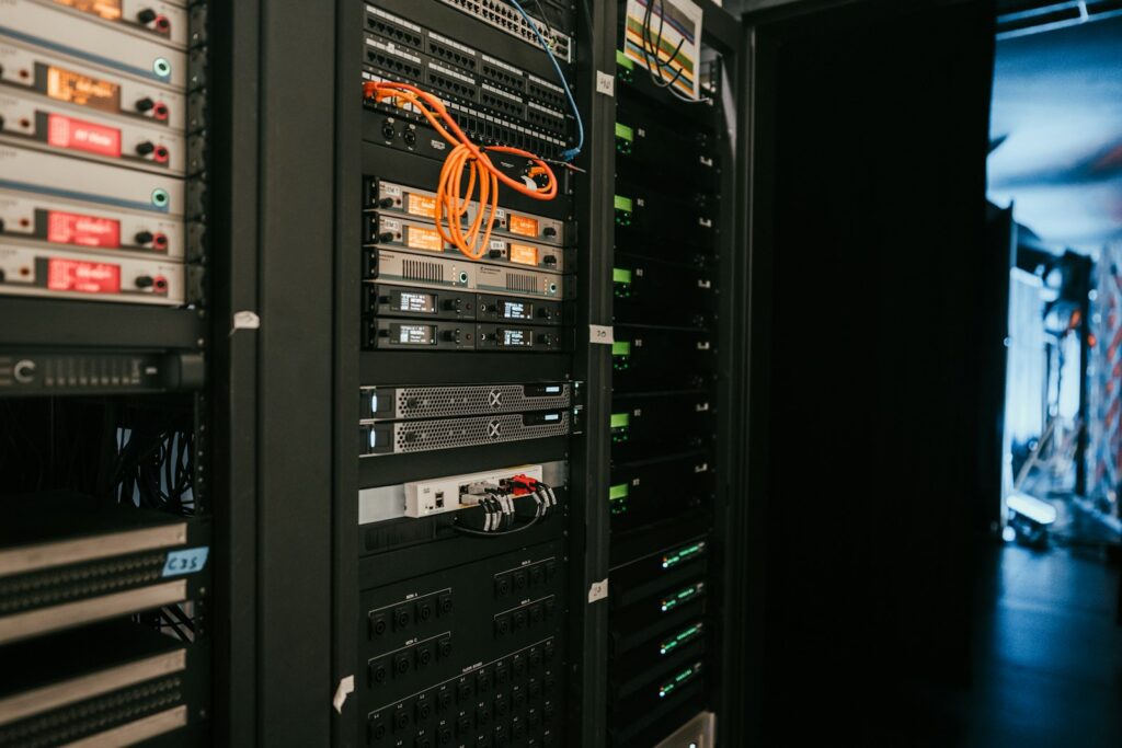 Server racks with network equipment in a server room