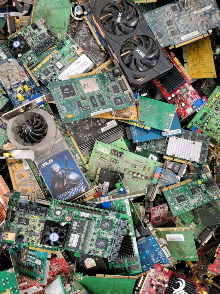 Pile of used circuit boards and computer components