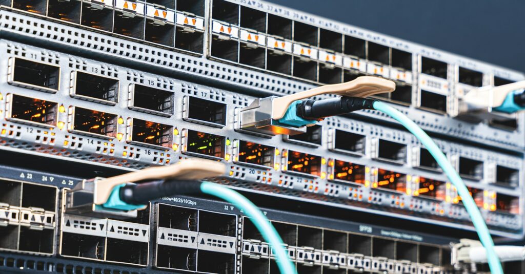 High-density data center switch with fiber cables connected