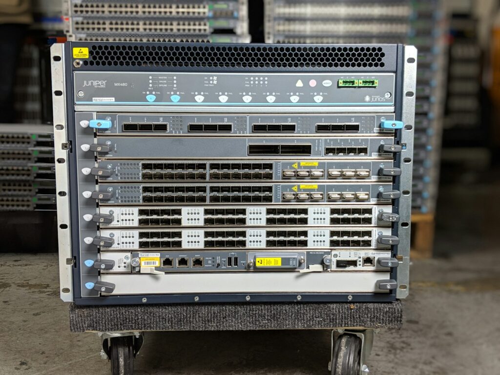Modular network chassis with line cards on a rolling cart